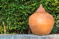 EarthenwareÃÂ With green foliage in the background. Royalty Free Stock Photo